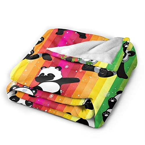 Colorful blanket with panda pattern on striped background.