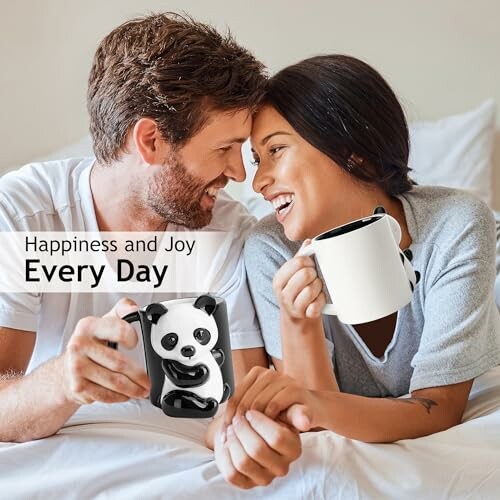 Couple smiling with panda-themed mugs