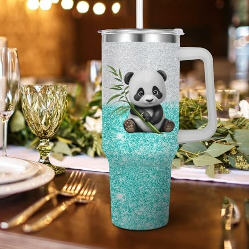 Glitter tumbler featuring a cute panda holding bamboo.