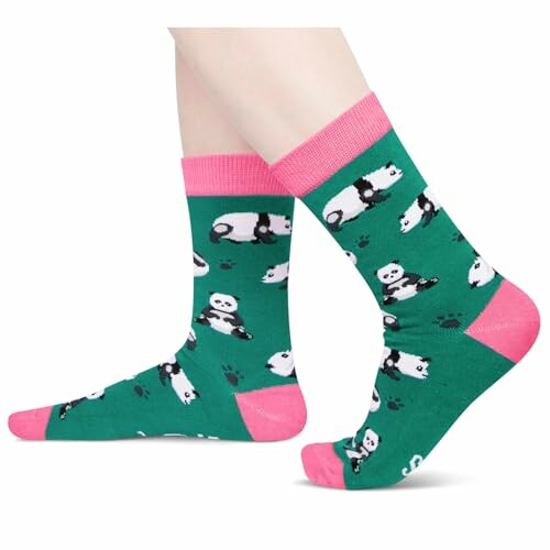 Green socks with panda design and pink accents