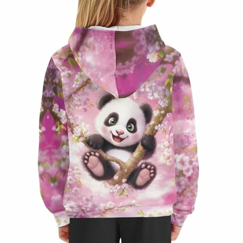 Child wearing panda hoodie with cherry blossom design