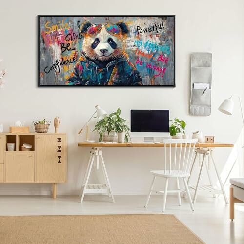 Room with panda graffiti wall art above a desk.