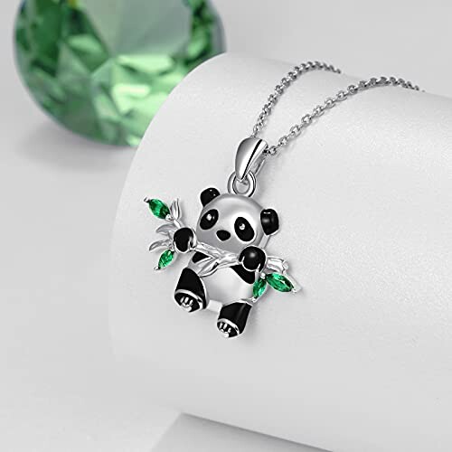 Silver panda pendant necklace with green accents