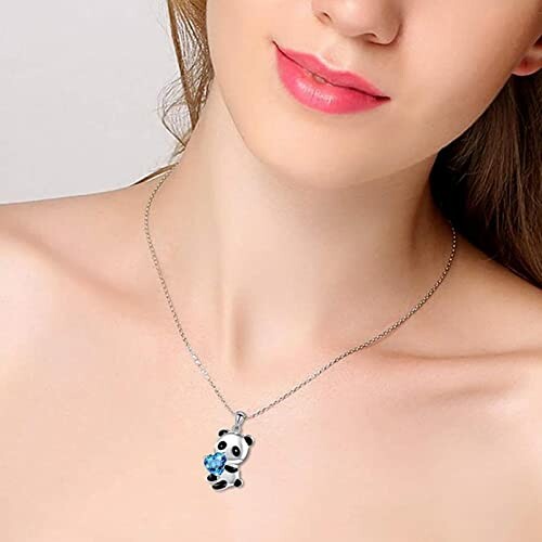 Woman wearing a panda pendant necklace